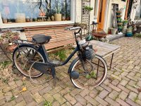 Man beachte den Auspuff beim Vorderrad